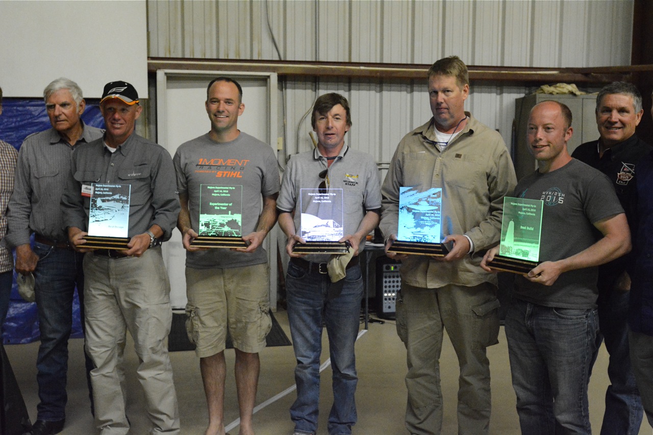 Mojave award winners received novel illuminated trophies. From left: Dick Rutan, Kevin Eldredge, Andrew Findlay, Rian Johnson, Tom Siegler, Joe Coraggio and speaker James Brown.