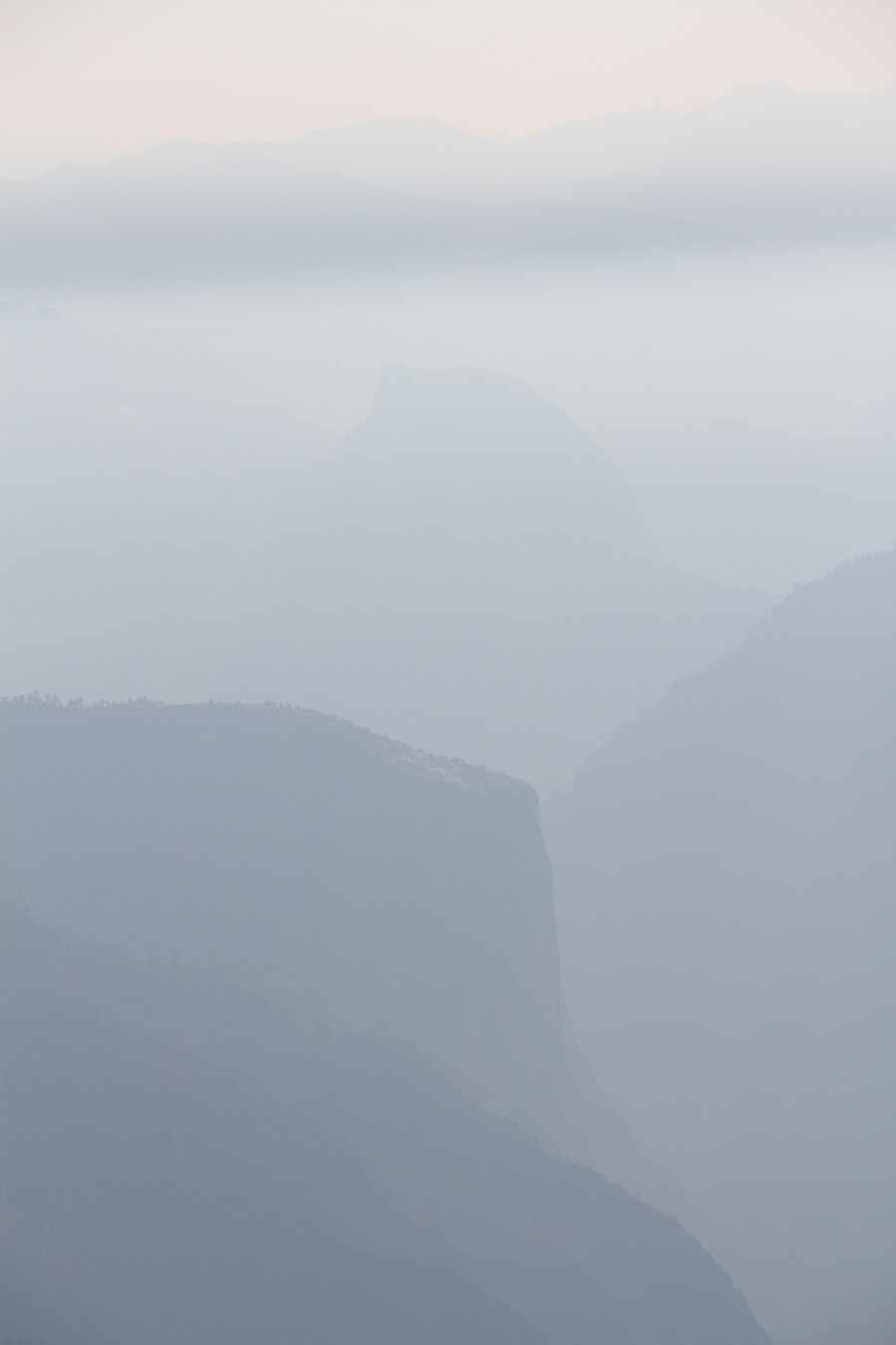 A view of Yosemite Valley during Fire Season - the shadowy shapes of El Capitan and Half Dome barely visible to those who know them.