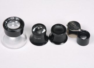 From left to right: A photographer’s loupe, two watchmaker’s loupes, and a folding pocket loupe.