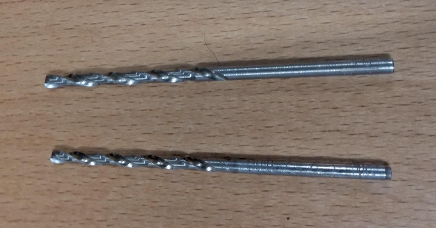 #42 drill bit on the bottom and #40 bit on top.