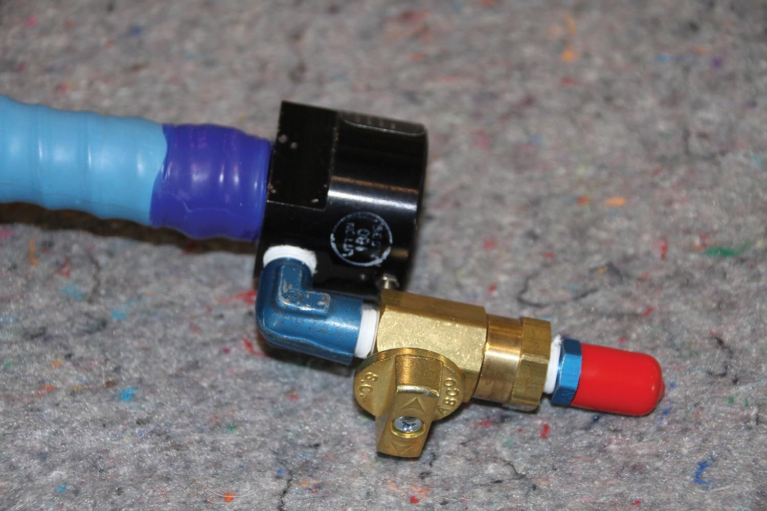 The CRU-79/P needs an On/Off valve and an AN fitting to connect to the hose from your first-stage regulator.